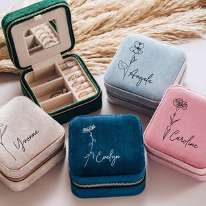 Personalized zippered travel jewelry boxes with floral names Angel and Caroline