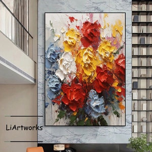 Textured floral abstract canvas painting with colorful 3D flower blooms in a frame
