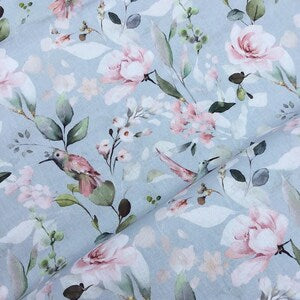 Blue cotton fabric with rose flowers, small birds, and green leaves for dressmaking