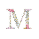 Floral embroidery letter M with pink roses and yellow flower accents