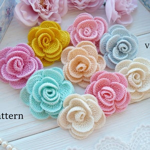 Set of crocheted flower motifs in pink, yellow, blue, and cream with curled petals