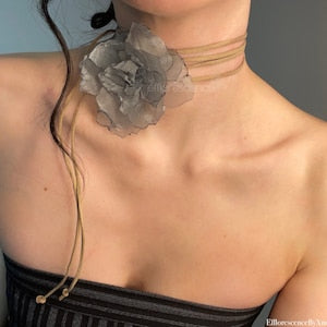 Light green choker with large fabric flower centered at the front