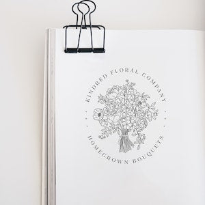 Floral bouquet stamp, oval wildflower bouquet line art for branding and invitations