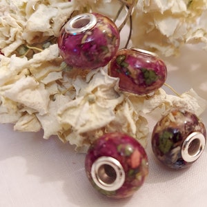 Sterling silver flower bead charm with dried petals, oval pink-purple beads