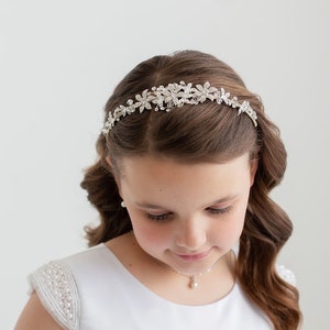 Silver rhinestone flower girl tiara headband with glittering leaf detail across hair