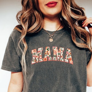 Dark gray women's T-shirt with colorful floral MAMA lettering on front