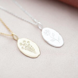 Oval birth flower pendant necklace with engraving, silver-tone and gold-tone