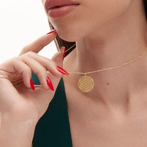 14K gold flower-of-life pendant necklace with thin chain, round sacred geometry charm