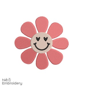 Pink flower embroidery design with a smiling face and stitched petals