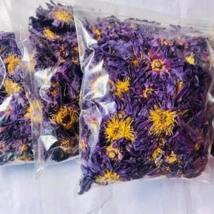 Sun-dried blue lotus flowers, whole and crushed, in a clear packaging bag