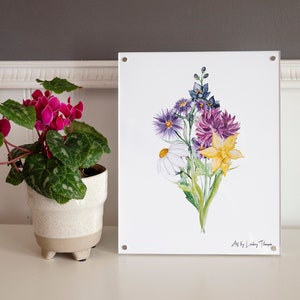 Birth flower bouquet art print with purple, yellow, and pink blooms on white panel