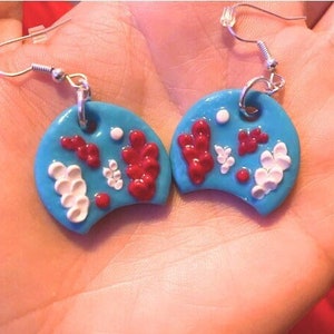 Turquoise polymer clay flower earrings with red and pink blossoms, glossy UV resin, silver hooks