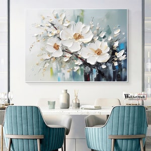3D textured flower wall art with white blooms on soft blue abstract background