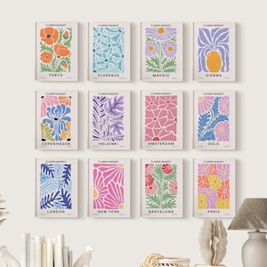 Set of 12 pastel floral art prints with framed gallery wall layout