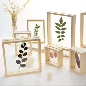 Wooden double-glass float picture frame with pressed leaves and dried flowers