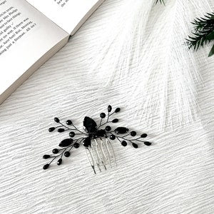 Black rhinestone flower hair comb with slim comb base and black crystal branch