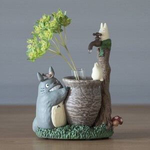 Totoro-themed mini figure vase with gray character, tiny white figure, and tree