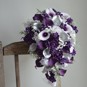 Purple and white faux flower bridal bouquet with cascading calla lilies and roses