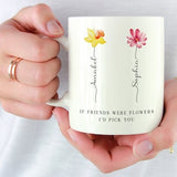 White ceramic mug with flower icons and friendship quote: 'I'd pick you'