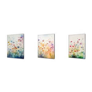 Wildflower art print canvas wall decor with watercolor meadow blooms, three-panel view