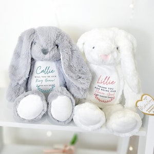 Personalised plush bunny rabbit teddies, gray and white, with stitched names and heart tags