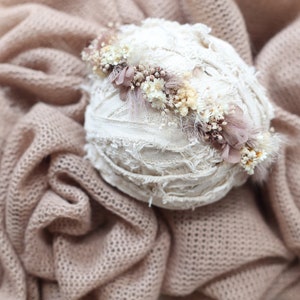Newborn cream knit tieback headband with ruffled lace flower and pearl accents