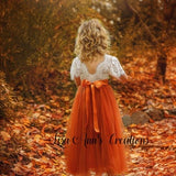 Girls orange tulle flower girl dress with lace sleeves and bow