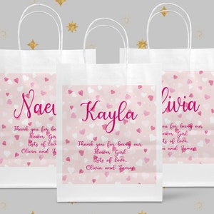 White gift bag with pink hearts and name Kayla printed