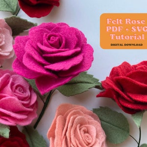 Assorted felt rose flowers with layered petals and green leaf accents