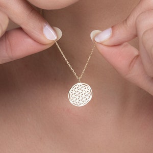 Silver-tone necklace with round Flower of Life pendant