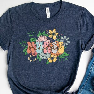 Dark blue nurse T-shirt with colorful floral text front graphic