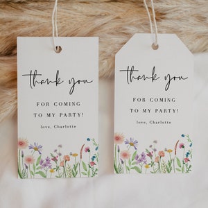 Wildflower thank-you favor tags, white with colorful blooms and 'thank you' text, hanging