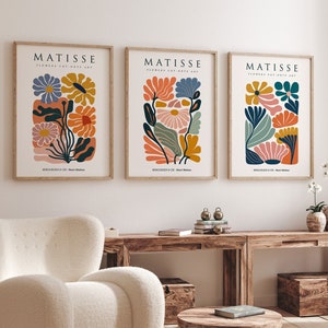 Set of 3 framed flower market art prints with colorful botanical illustrations on light paper