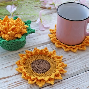Crochet flower-shaped coaster pattern with orange and yellow textured petals