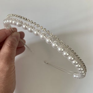 Silver pearl and rhinestone headband with curved band and bead details