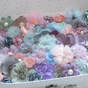 Assorted pastel faux silk fabric flowers with lace and pearl accents for crafts