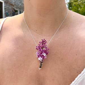 Purple flower pendant wire coil necklace on silver chain
