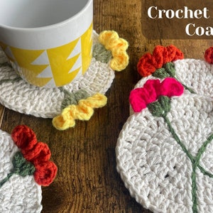 Crochet flower coasters with 3D petals, including one under a mug