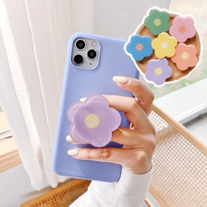 Foldable flower phone stand grip, purple with pastel flower shapes on back