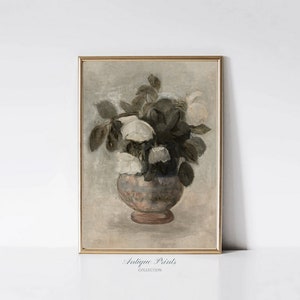 Framed vintage floral still life print of roses in a vase, warm neutral tones