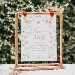 Floral flower bar sign on a wooden easel with 'Flower Bar' text