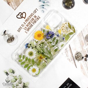 Clear phone case cover skin with pressed daisies and blue-purple flowers