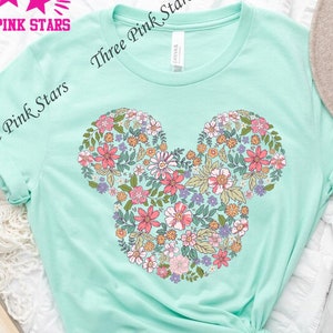 Mint floral Mickey head t-shirt with colorful flower graphic on chest