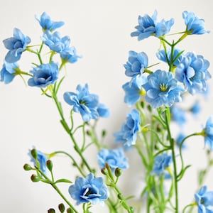 Light blue artificial delphinium flowers on green stems, 6-stem bundle