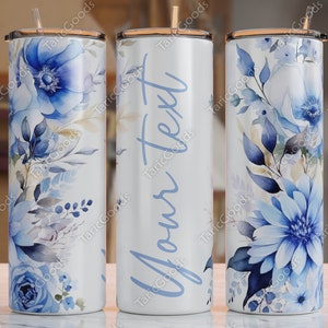 Blue floral tumbler wrap design on three slim 20oz skinny tumblers