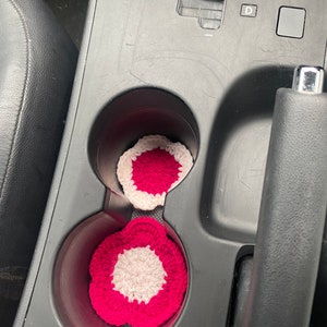 Car cup holder coaster set with two heart-shaped red coasters