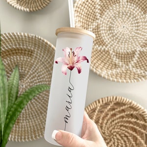 Frosted glass tumbler with pink birth flower decal and cursive text