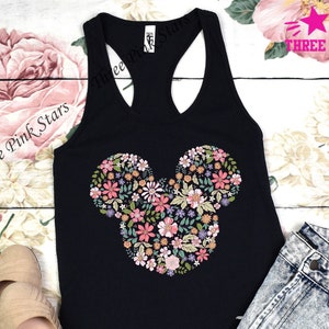 Black racerback tank top with floral heart graphic on front