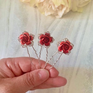 Set of 3 red flower bridal hair pins with silver stems and sparkly centers