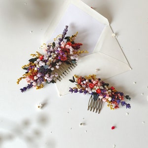 Colorful wildflower bridal hair comb with dense floral cluster and metal teeth